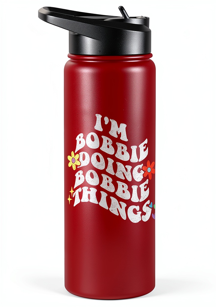 Personalized Bobbie tumbler with floral design on a table